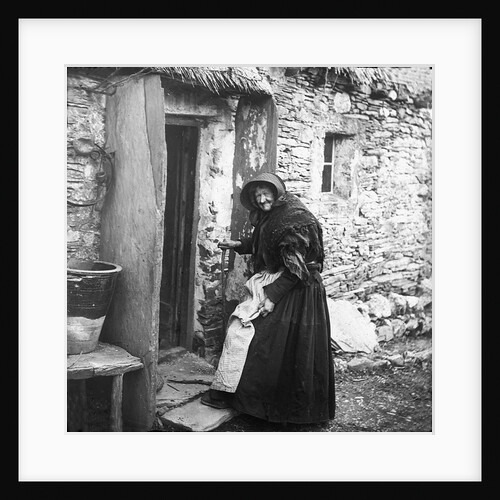 Woman entering Thatched Cottage, Sulby, Isle of Man by George Bellett Cowen